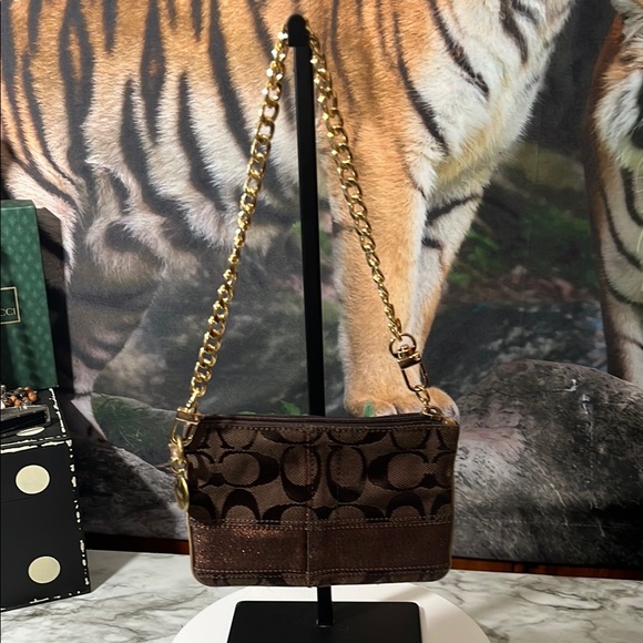 Coach Handbags - COACH LEGACY WRISTLET WITH AFTER MARKET CHAIN.